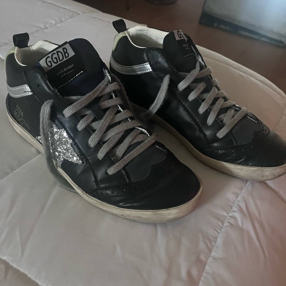Semi new Holden goose sneaker.